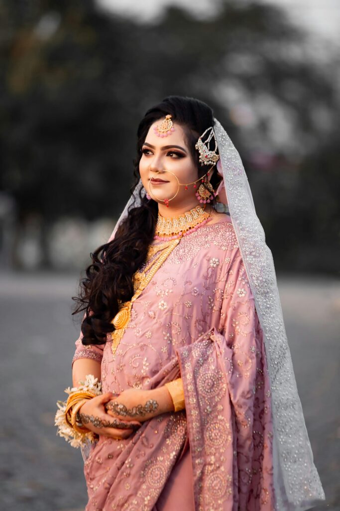 Portrait of an Indian bride in a traditional wedding dress, glowing with elegance.